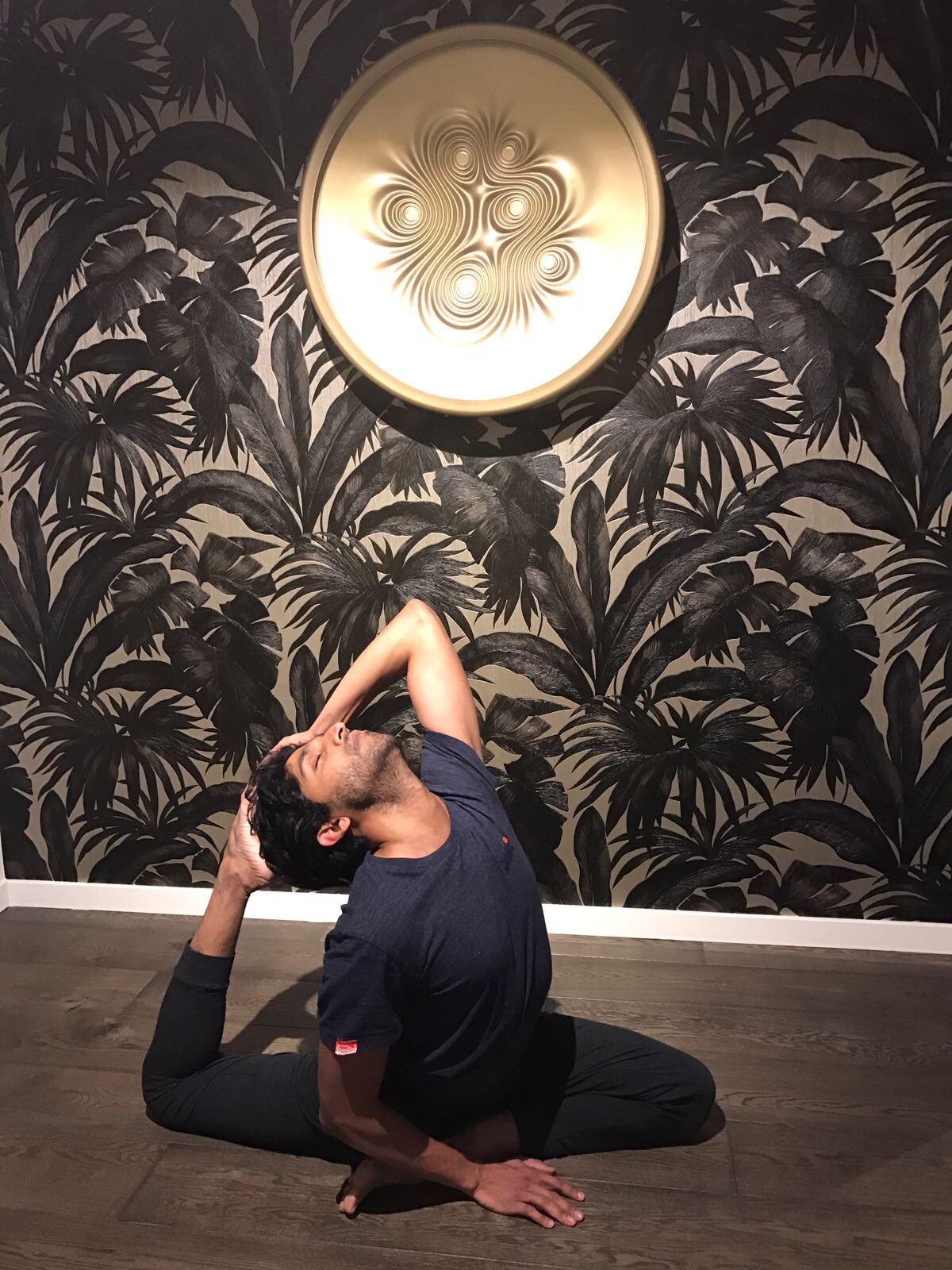 Farooq demonstrating an advanced seated backbend during his personal yoga practice